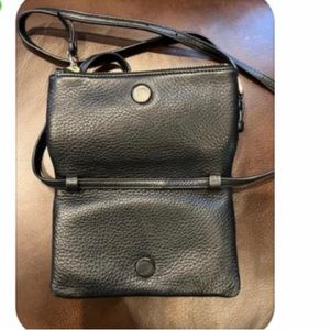 Used Tory Burch foldover crossbody.
